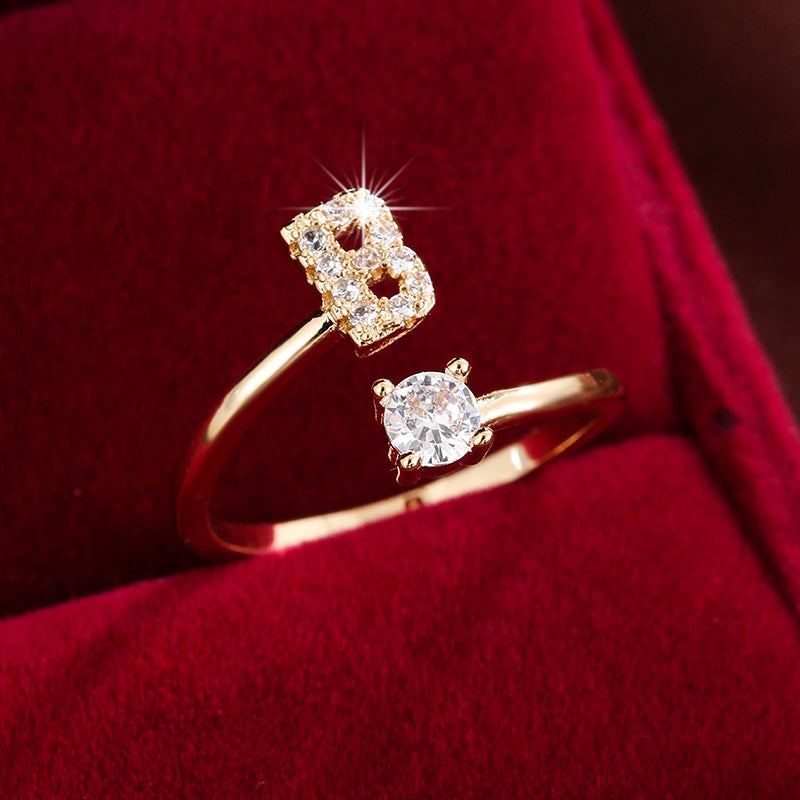 [Copper Fashion Ring] Four-claw Round Zirconia Adjustable Copper Ring With 26 English Letters