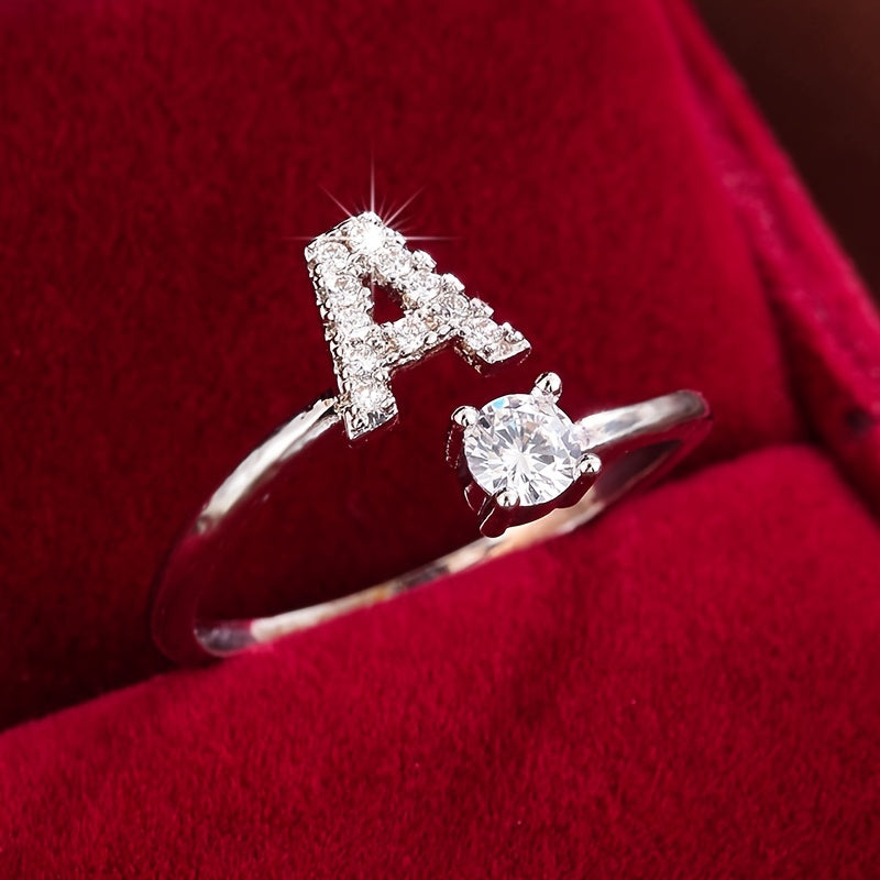 [Copper Fashion Ring] Four-claw Round Zirconia Adjustable Copper Ring With 26 English Letters