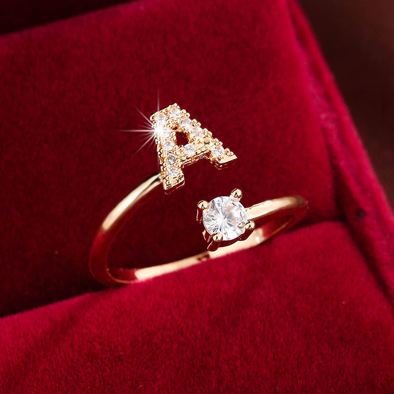 [Copper Fashion Ring] Four-claw Round Zirconia Adjustable Copper Ring With 26 English Letters