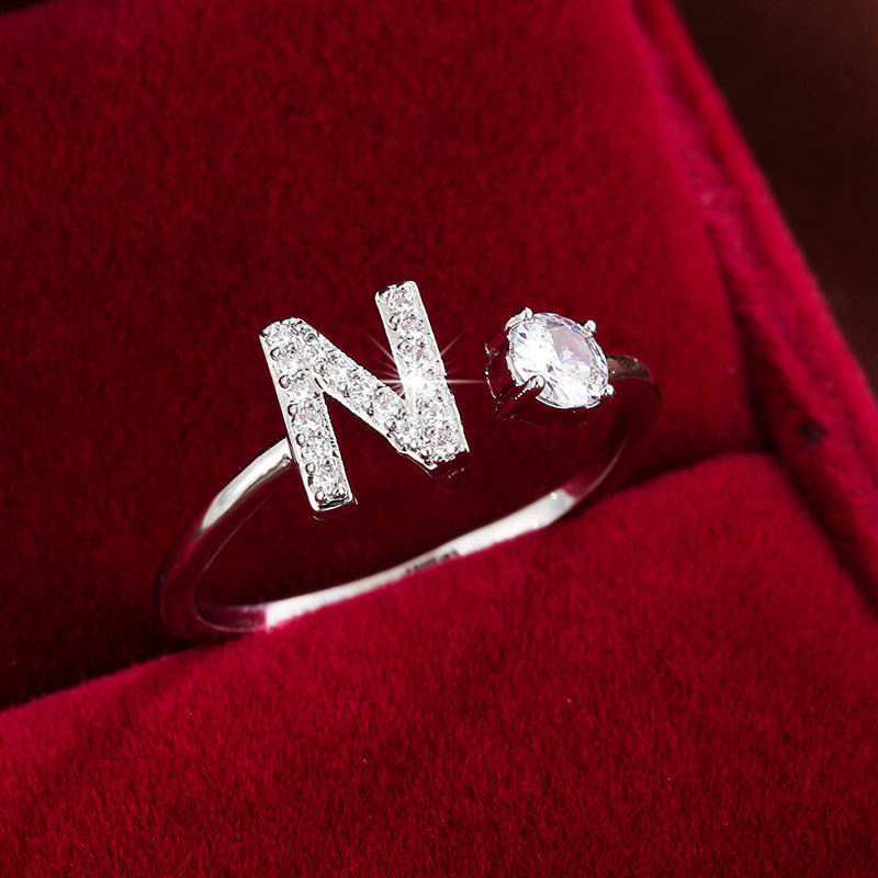 [Copper Fashion Ring] Four-claw Round Zirconia Adjustable Copper Ring With 26 English Letters