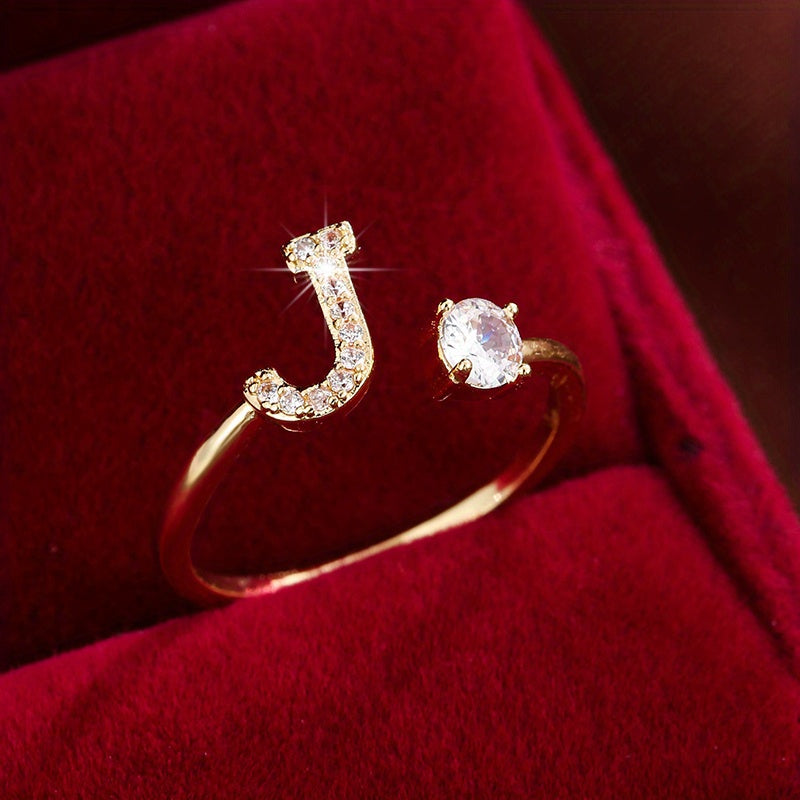 [Copper Fashion Ring] Four-claw Round Zirconia Adjustable Copper Ring With 26 English Letters