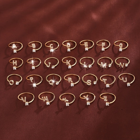[Copper Fashion Ring] Four-claw Round Zirconia Adjustable Copper Ring With 26 English Letters