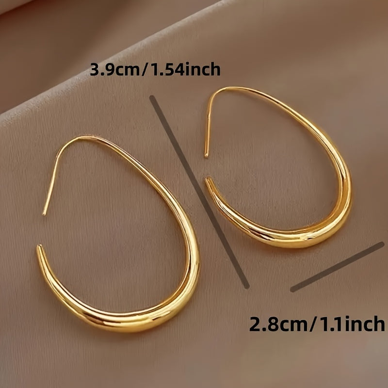A Pair Of Minimalist Water Drop-shaped Earrings Exclusively Designed For Ladies, A Gift Of Elegance And Grace For Women.